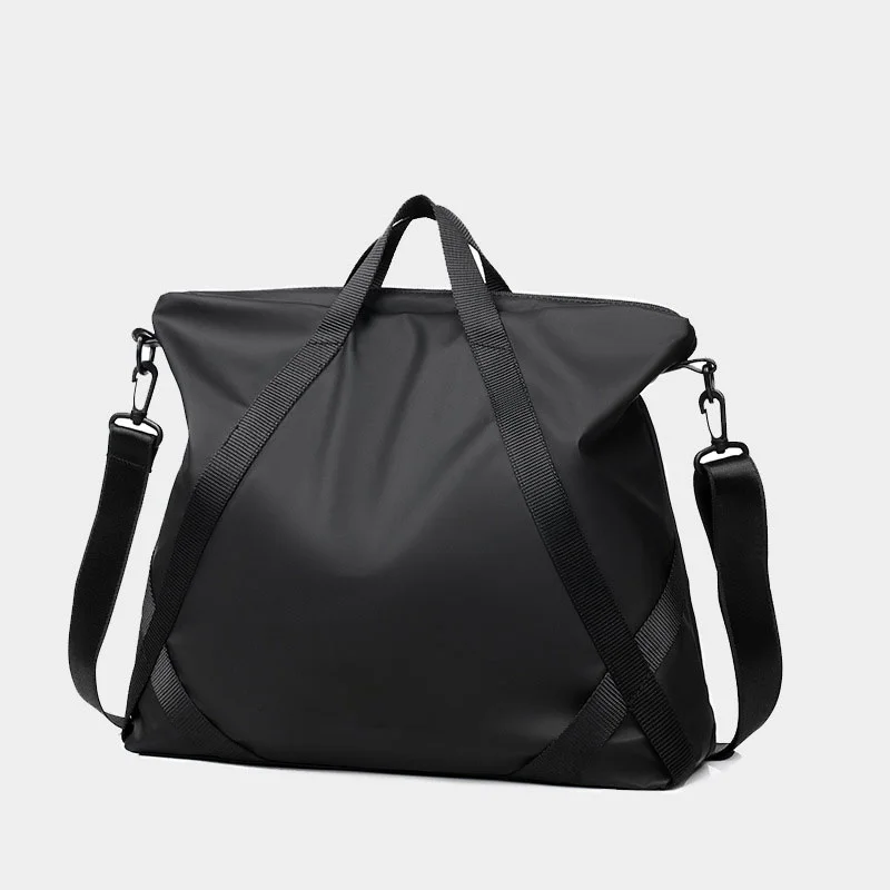 Guangzhou Fuliya Industry Co.,Ltd C-81403 This nylon & PU leather bag is water-repellent, large-capacity for a laptop, with comfortable handle and detachable shoulder strap - perfect for commuting, business, and school.
