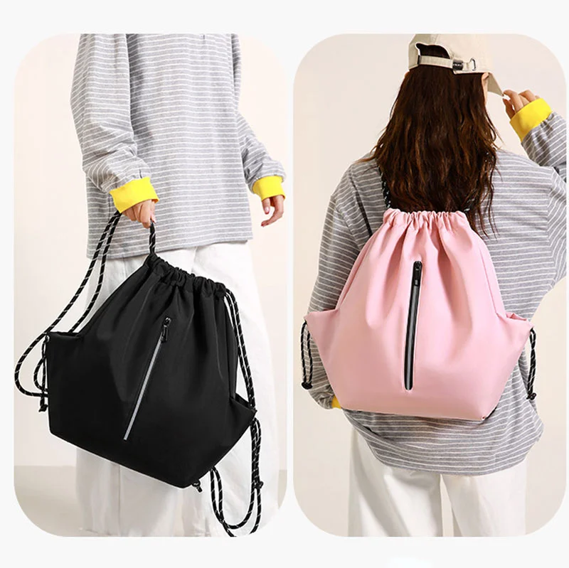 Guangzhou Fuliya Industry Co.,Ltd C-81404 This lightweight (290g) drawstring bag features reflective strips, large capacity, front/side pockets, and an anti-theft back pocket - perfect for outdoor, travel, and daily use.