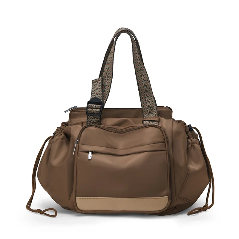 Guangzhou Fuliya Industry Co.,Ltd C-81405 This foldable mommy bag features a separate wet/dry compartment, transforms into a shopping basket or carry cot, fits over luggage handles, and is easy to carry.