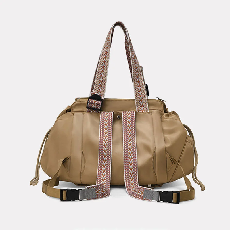 Guangzhou Fuliya Industry Co.,Ltd C-81405 This foldable mommy bag features a separate wet/dry compartment, transforms into a shopping basket or carry cot, fits over luggage handles, and is easy to carry.