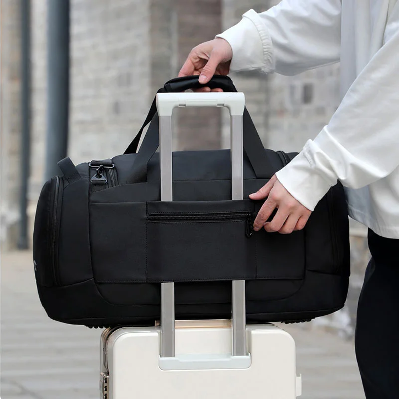 Guangzhou Fuliya Industry Co.,Ltd C-81417 This large-capacity travel bag is waterproof and durable, with smart compartments for 3-5 day trips, adjustable shoulder strap, and trolley strap - for business trips, travel, and gym.