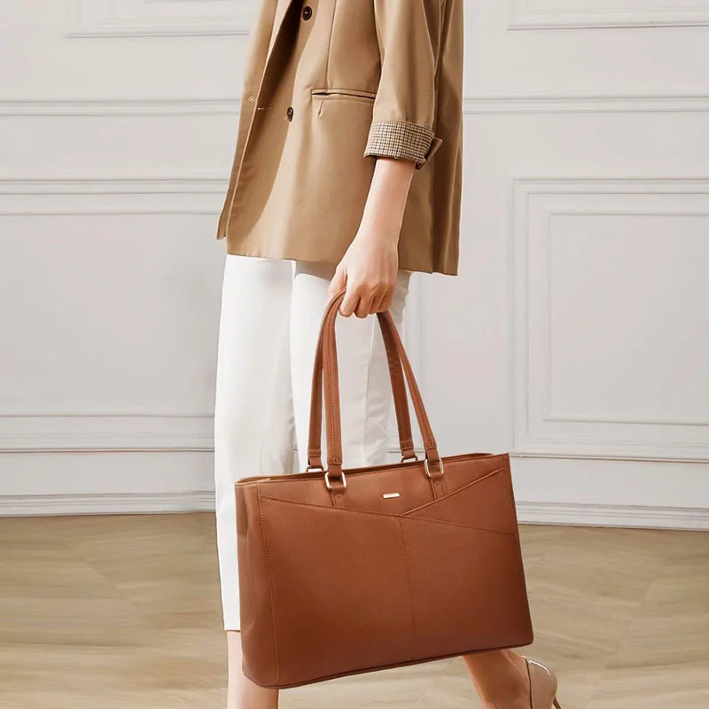 Guangzhou Fuliya Industry Co.,Ltd C-81439 This tote bag is water‑repellent, large‑capacity for a 15.6″ laptop, with multiple compartments, magnetic buckle and back zip pocket, hand/shoulder carry, minimalist design – for commuting, school, and travel.