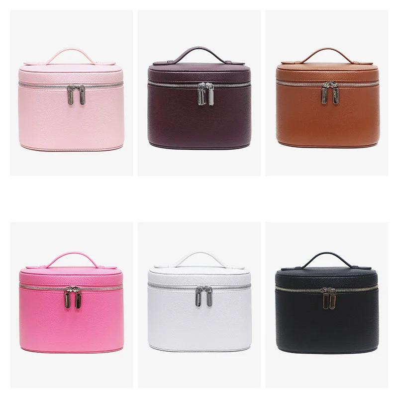 Guangzhou Fuliya Industry Co.,Ltd C-81454 This PU makeup bag features macaron colors, large capacity with compartments, smooth zipper and wide handle – for business trips, travel, and daily use.