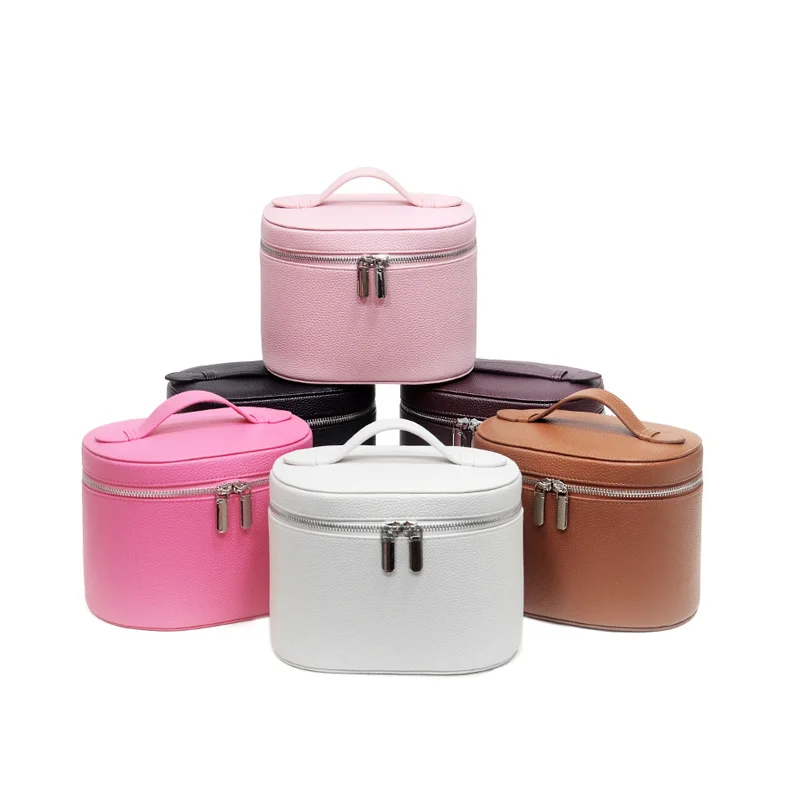 Guangzhou Fuliya Industry Co.,Ltd C-81454 This PU makeup bag features macaron colors, large capacity with compartments, smooth zipper and wide handle – for business trips, travel, and daily use.
