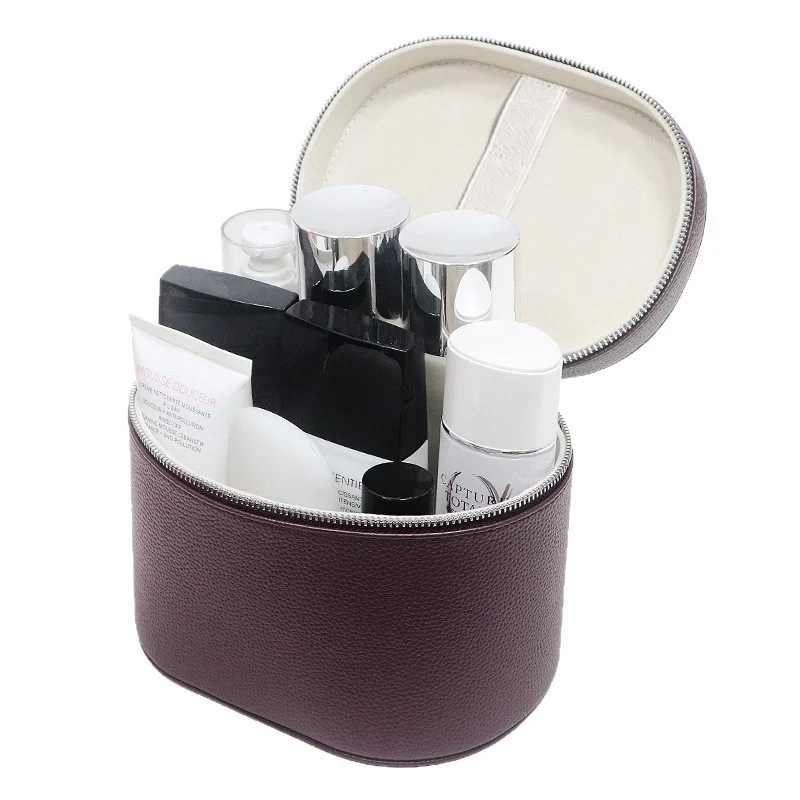 Guangzhou Fuliya Industry Co.,Ltd C-81454 This PU makeup bag features macaron colors, large capacity with compartments, smooth zipper and wide handle – for business trips, travel, and daily use.