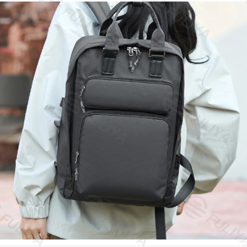 Guangzhou Fuliya Industry Co.,Ltd C-81464 This versatile backpack fits a laptop, is water‑repellent and stain‑resistant, includes a detachable insulated bottle pouch, and has a trolley strap – suitable for business, commuting, and family outings.