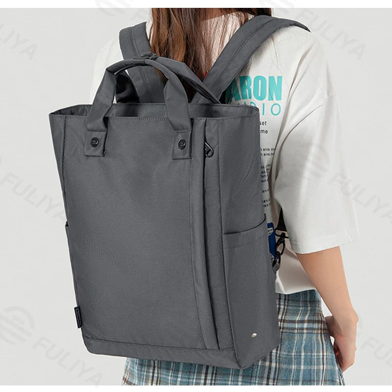 Guangzhou Fuliya Industry Co.,Ltd C-81326/FLY-238174 Large-capacity water-repellent backpack, convertible between backpack and hand carry, hidden straps, built-in laptop compartment, multiple pockets- for business, casual, and travel.