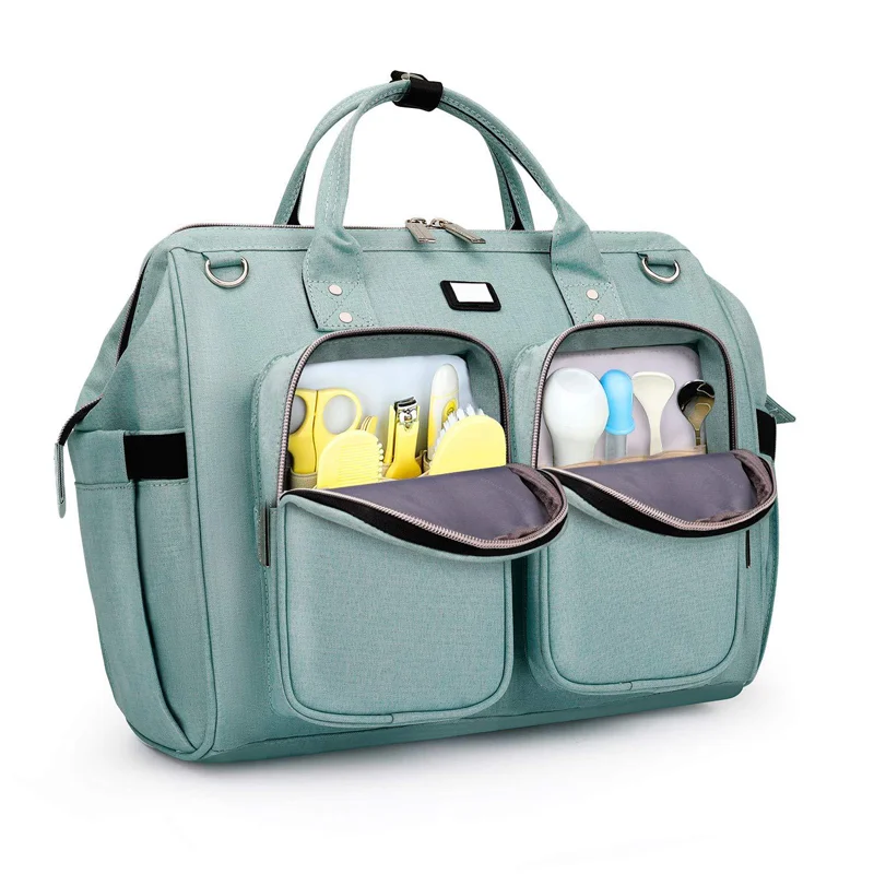 Guangzhou Fuliya Industry Co.,Ltd C-80802 Waterproof large-capacity diaper tote bag, supports hand/shoulder/crossbody carry. Features stroller hooks, front pockets, and a changing pad. For baby daily travel.