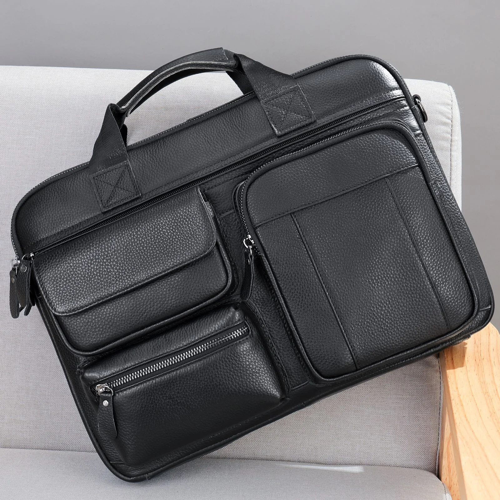 Guangzhou Fuliya Industry Co.,Ltd C-80908 Men's top-grain cowhide briefcase, large capacity, multi-functional pockets, rear anti-theft pocket, magnetic buckle, and adjustable strap - hand or shoulder carry for business, commuting, and business trips.