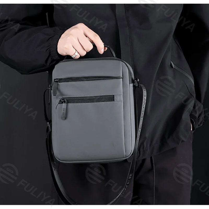 Guangzhou Fuliya Industry Co.,Ltd C-80916 New men's crossbody bag, high-density water-repellent nylon, multi-layer large capacity, multiple pockets, and adjustable strap - hand or shoulder carry for commuting, travel, and outdoor.