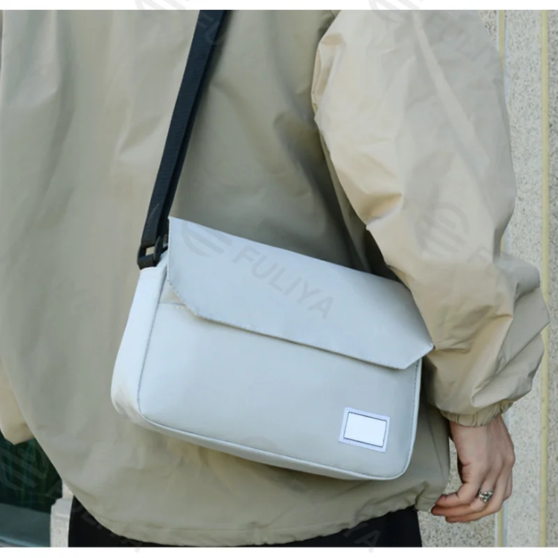 Guangzhou Fuliya Industry Co.,Ltd C-80923  Stylish minimalist crossbody bag, lightweight fabric approx. 0.21kg, square design, multi-compartment large capacity - for commuting, outdoor, sports, and business trips.