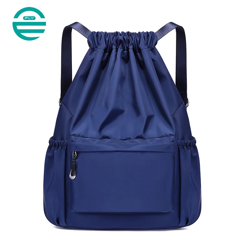 Guangzhou Fuliya Industry Co.,Ltd C-80956 Water-resistant drawstring backpack with durable water-repellent fabric and a wet/dry separation bag. Drawstring closure and adjustable straps. Lightweight and sturdy. For sports, travel, and daily use.