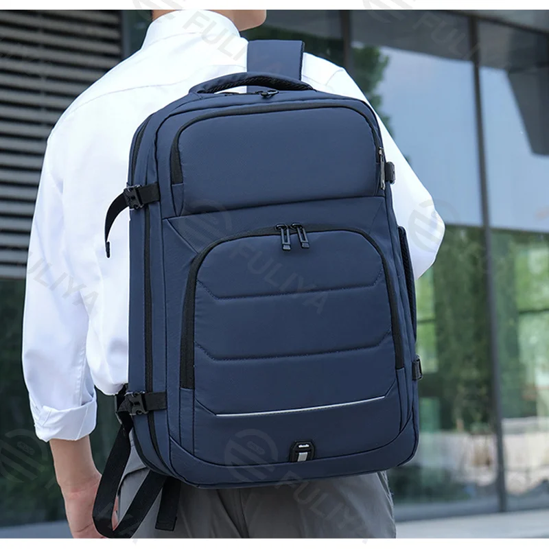 Guangzhou Fuliya Industry Co.,Ltd C-80966 Water-resistant expandable business backpack. 17" laptop sleeve, USB port, honeycomb back pad. H/V switchable. For business commuting.