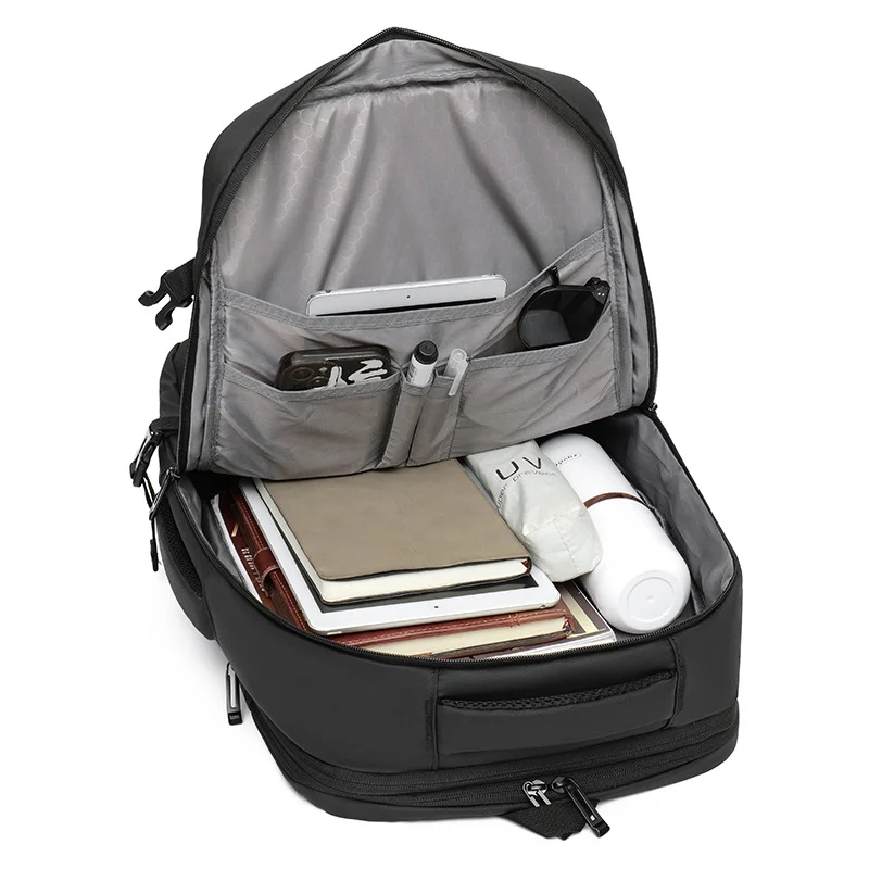 Guangzhou Fuliya Industry Co.,Ltd C-80966 Water-resistant expandable business backpack. 17" laptop sleeve, USB port, honeycomb back pad. H/V switchable. For business commuting.