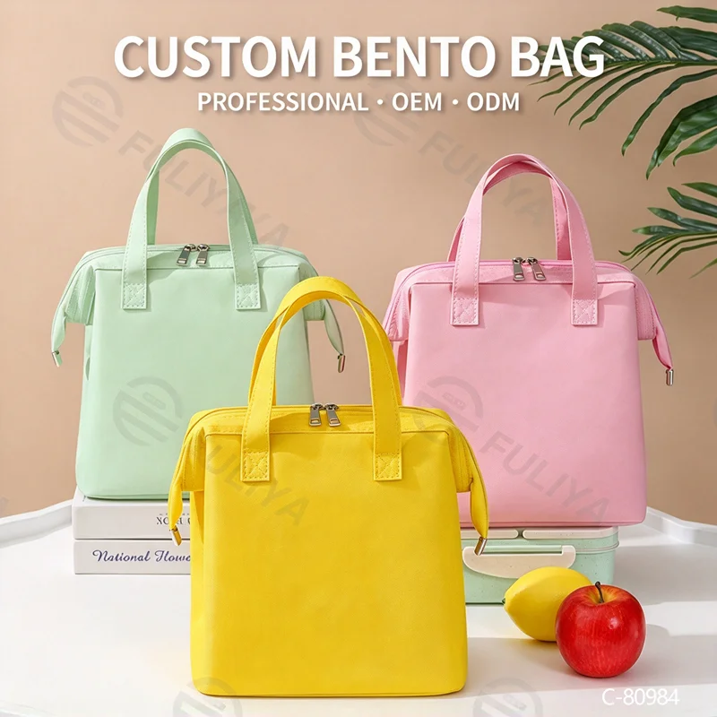 Guangzhou Fuliya Industry Co.,Ltd C-80984  Portable Macaron large-capacity lunch bag. Foil-lined layer keeps food warm/cold for 2-4 hours. Fits bento and fruit. For commuting and picnics.