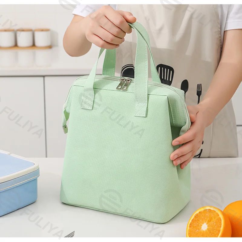 Guangzhou Fuliya Industry Co.,Ltd C-80984  Portable Macaron large-capacity lunch bag. Foil-lined layer keeps food warm/cold for 2-4 hours. Fits bento and fruit. For commuting and picnics.