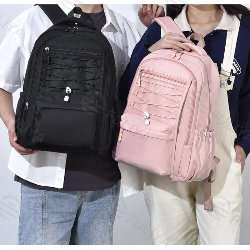 Guangzhou Fuliya Industry Co.,Ltd C-80985 Minimalist unisex backpack with water-resistant, scratch-proof fabric. Features decompression honeycomb straps and multi-pocket storage. For commuting, travel, and school.