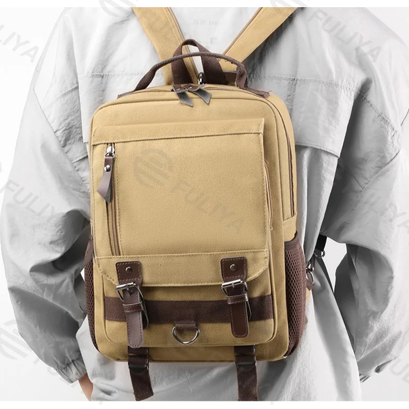 Guangzhou Fuliya Industry Co.,Ltd C-80986 Retro canvas multi-function backpack with large multi-layer storage. Zipper and hook straps support backpack, shoulder, hand carry, and left/right switching. For school, commuting, and travel.