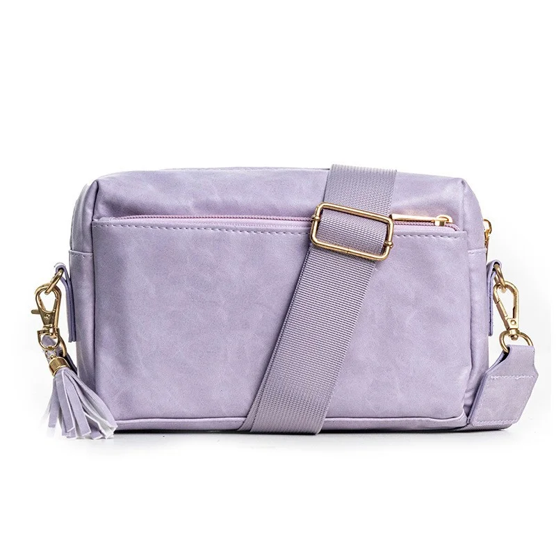 Guangzhou Fuliya Industry Co.,Ltd C-80995 Retro soft leather crossbody bag with detachable tassel and wide strap. Multi-compartment design for daily essentials. For commuting and casual wear.