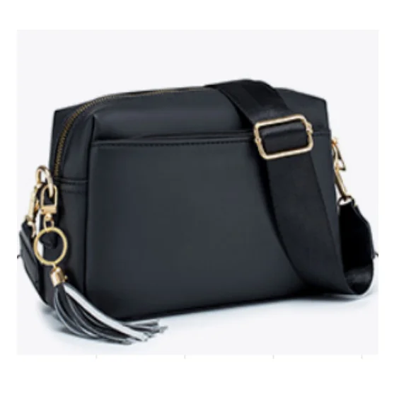 Guangzhou Fuliya Industry Co.,Ltd C-80995 Retro soft leather crossbody bag with detachable tassel and wide strap. Multi-compartment design for daily essentials. For commuting and casual wear.