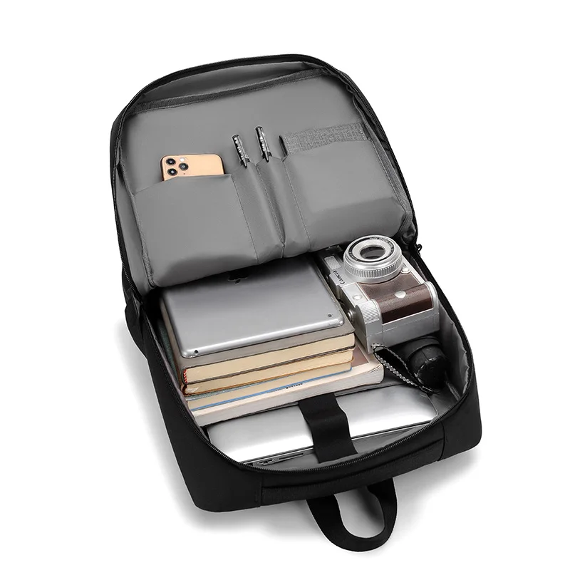 Guangzhou Fuliya Industry Co.,Ltd C-81015 Stylish lightweight backpack, water-resistant, large capacity, laptop compartment, external USB port, comfortable handle, and breathable shoulder straps - for commuting, travel, and casual use.