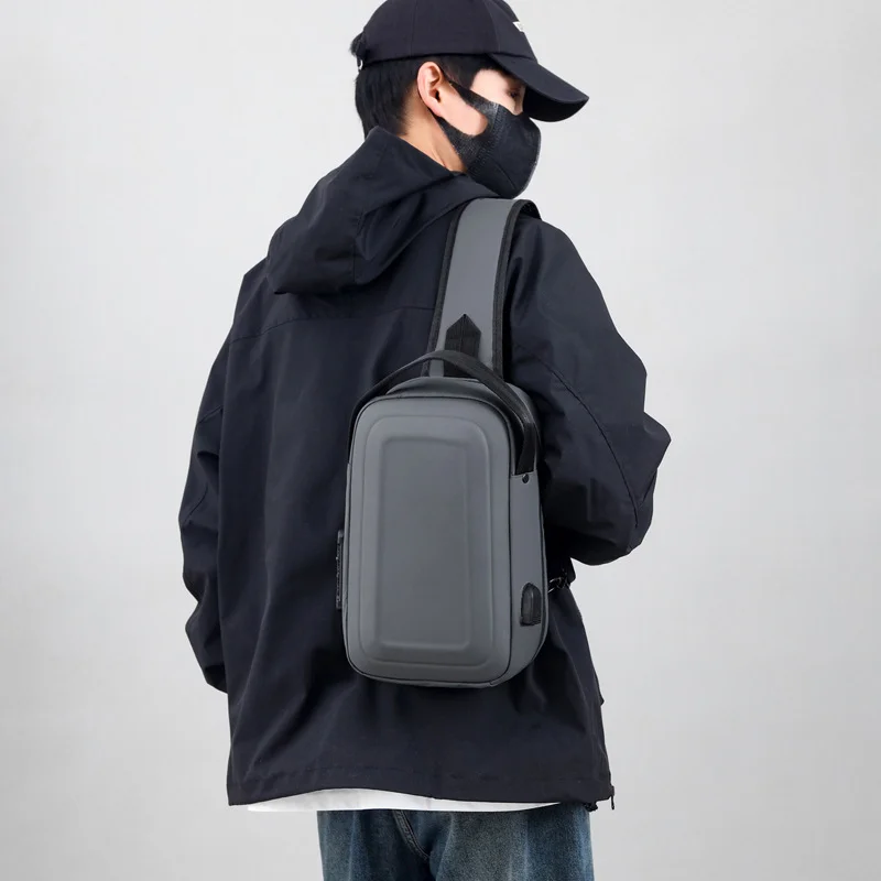 Guangzhou Fuliya Industry Co.,Ltd C-81025 Men's hard-shell chest bag, water-resistant, large capacity, external USB port, 3-digit combination lock, and adjustable strap - left/right shoulder switchable for commuting, business trips, and daily use.