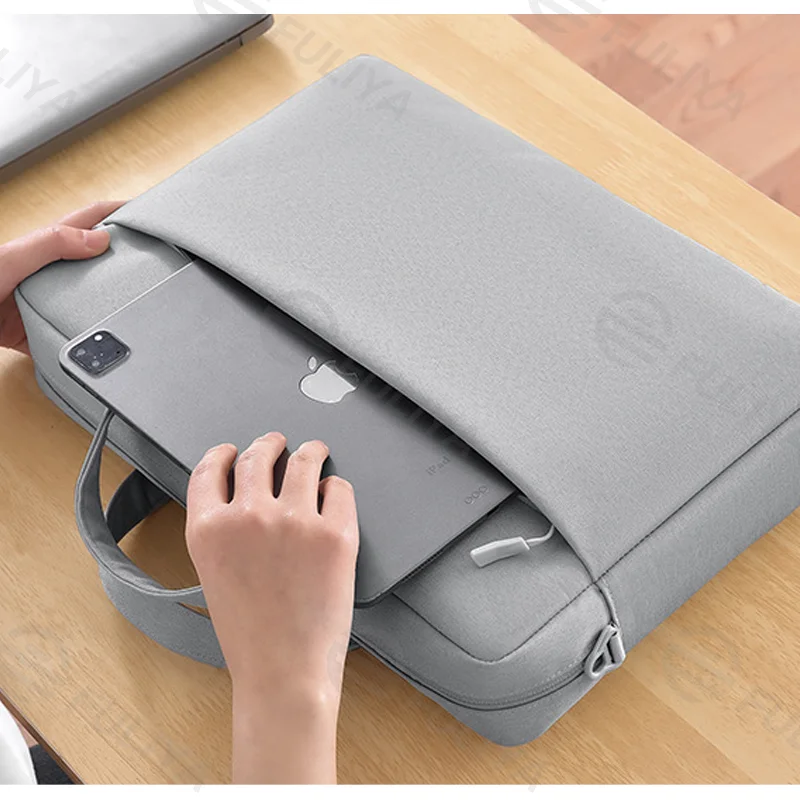 Guangzhou Fuliya Industry Co.,Ltd C-81058 Laptop bag, water-resistant, air cushion shockproof, large capacity, comfortable handle, dual zipper, detachable strap, and luggage strap - hand or shoulder carry for commuting, business, and travel.